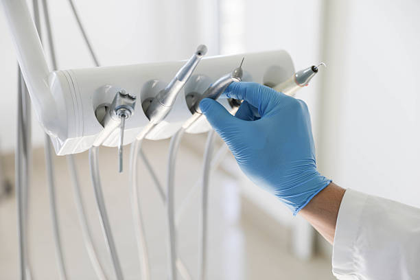 Professional Tooth Extraction technician working in Henderson, TX